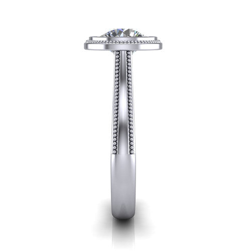 Adelina round solitaire engagement ring in Platinum, side profile showing the tapered split-shoulder shank with milgrain edge detail and the cathedral gallery