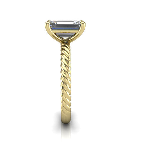 Claire emerald classic solitaire engagement ring in 14K Yellow Gold — side profile showing the twisted rope shank flowing into the cathedral gallery and 4-prong setting