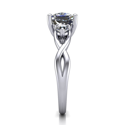 Lydia cushion three stone engagement ring in Platinum, side profile showing the round side diamonds, floral gallery, and woven infinity shank