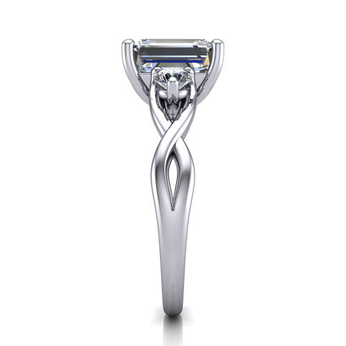 Lydia emerald three stone engagement ring in 14K White Gold, side profile showing the round side diamonds, floral gallery, and woven infinity shank