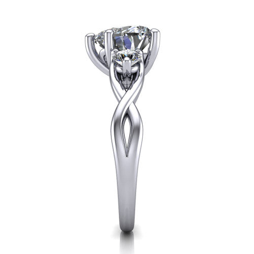 Lydia heart three stone engagement ring in Platinum, side profile showing the round side diamonds, floral gallery, and woven infinity shank