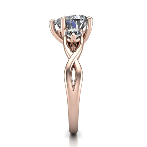Lydia heart three stone engagement ring in 18K Rose Gold, side profile showing the round side diamonds, floral gallery, and woven infinity shank