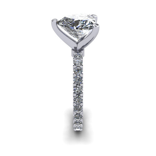 Elizabeth heart solitaire engagement ring in Platinum, side profile showing the pave diamonds running continuously around the shank