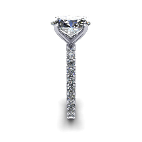 Elizabeth oval solitaire engagement ring in Platinum, side profile showing the pave diamonds running continuously around the shank