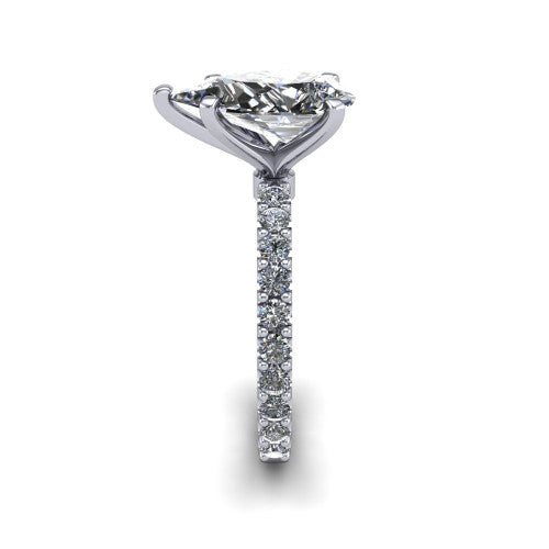 Elizabeth pear solitaire engagement ring in Platinum, side profile showing the pave diamonds running continuously around the shank