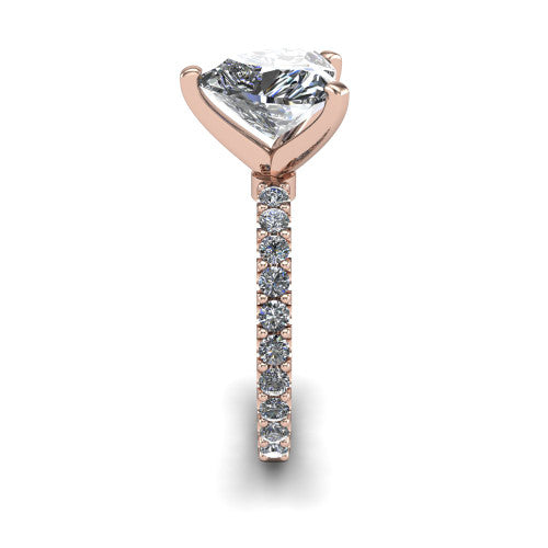 Elizabeth heart solitaire engagement ring in 18K Rose Gold, side profile showing the pave diamonds running continuously around the shank