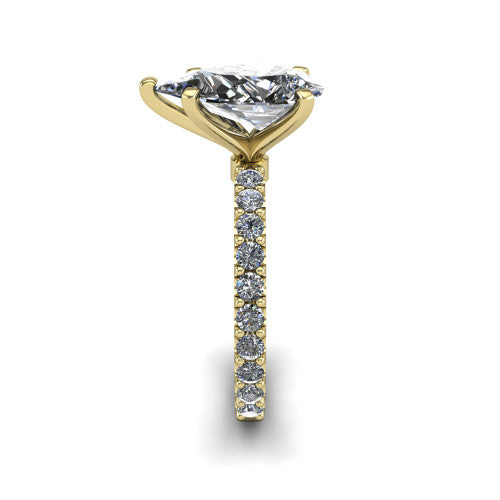 Elizabeth pear solitaire engagement ring in 14K Yellow Gold, side profile showing the pave diamonds running continuously around the shank