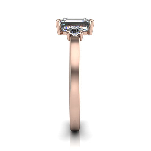 Olivia emerald three stone engagement ring in 18K Rose Gold, side profile showing the squared flat-top shank and three-stone head