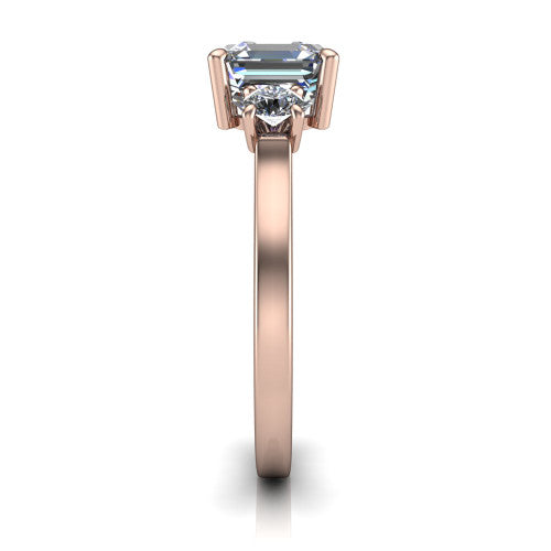 Olivia square emerald three stone engagement ring in 14K Rose Gold, side profile showing the squared flat-top shank and three-stone head