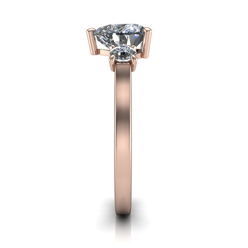 Olivia heart three stone engagement ring in 14K Rose Gold, side profile showing the squared flat-top shank and three-stone head