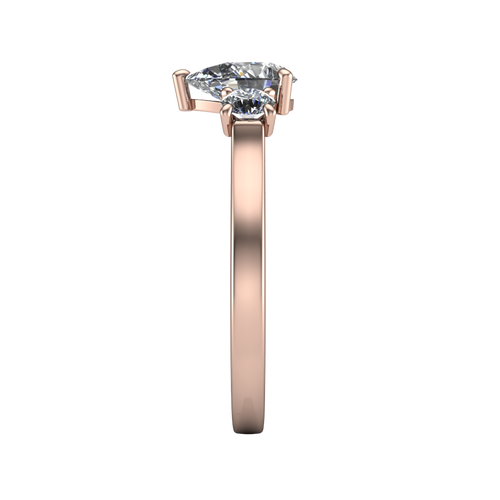 Olivia pear three stone engagement ring in 14K Rose Gold, side profile showing the squared flat-top shank and three-stone head