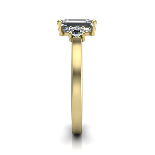 Olivia emerald three stone engagement ring in 18K Yellow Gold, side profile showing the squared flat-top shank and three-stone head