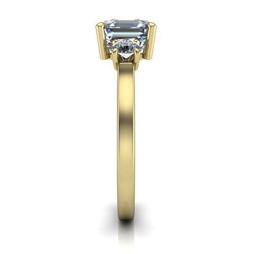 Olivia square emerald three stone engagement ring in 18K Yellow Gold, side profile showing the squared flat-top shank and three-stone head