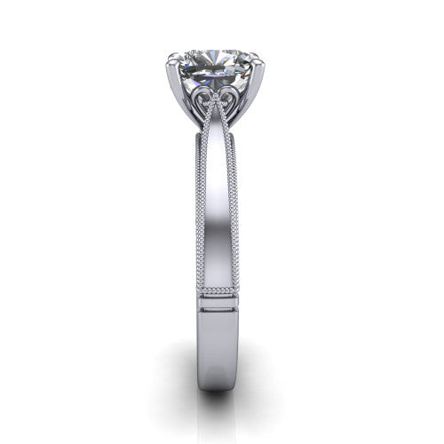 Adeline cushion solitaire engagement ring in Platinum, side profile showing the wide flat-top band with milgrain bead borders along top and bottom