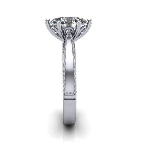 Adeline oval solitaire engagement ring in Platinum, side profile showing the wide flat-top band with milgrain bead borders along top and bottom