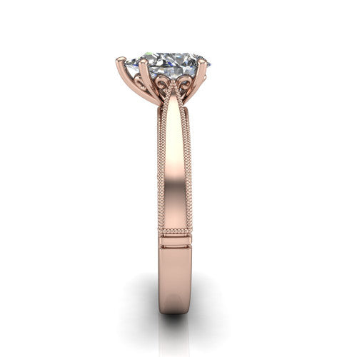 Adeline pear solitaire engagement ring in 14K Rose Gold, side profile showing the wide flat-top band with milgrain bead borders along top and bottom