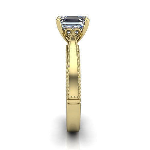 Adeline square emerald solitaire engagement ring in 14K Yellow Gold, side profile showing the wide flat-top band with milgrain bead borders along top and bottom