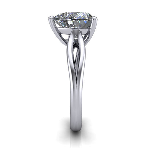 Beatrice heart solitaire engagement ring in Platinum, side profile showing the trellis crossover arms beneath the head and slim polished band