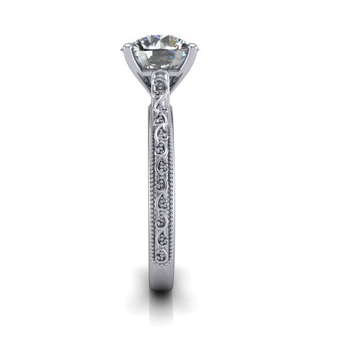 Violet round solitaire engagement ring in 18K White Gold, side profile showing the hand-engraved scroll motif and milgrain bead edges along the shank