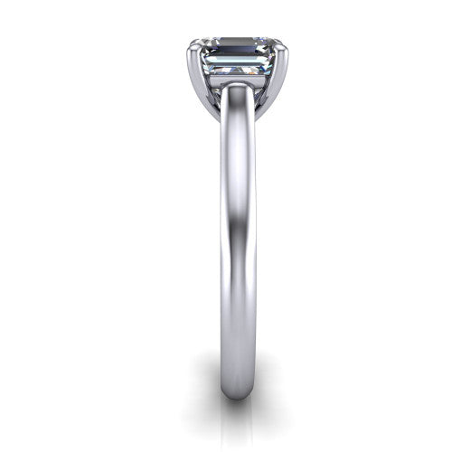 Saylor square emerald solitaire engagement ring in Platinum, side profile showing the cathedral head, filigree gallery scrolls, and tapered polished shank