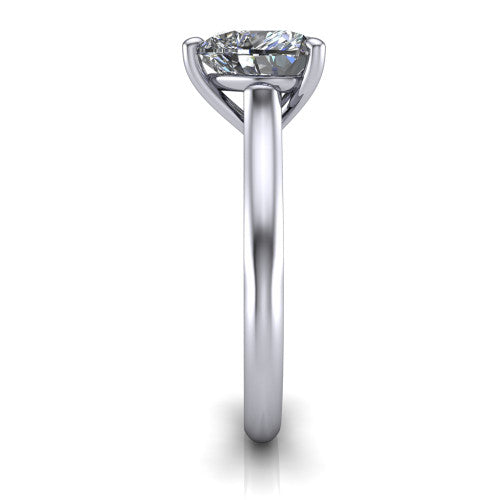 Saylor heart solitaire engagement ring in Platinum, side profile showing the cathedral head, filigree gallery scrolls, and tapered polished shank