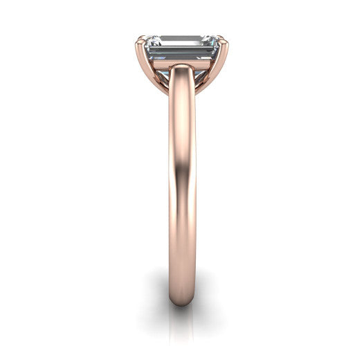 Saylor emerald solitaire engagement ring in 14K Rose Gold, side profile showing the cathedral head, filigree gallery scrolls, and tapered polished shank