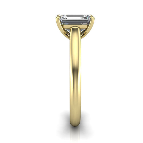 Saylor emerald solitaire engagement ring in 18K Yellow Gold, side profile showing the cathedral head, filigree gallery scrolls, and tapered polished shank