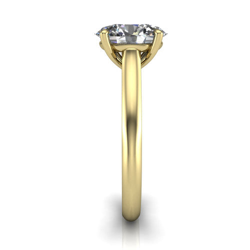 Saylor oval solitaire engagement ring in 14K Yellow Gold, side profile showing the cathedral head, filigree gallery scrolls, and tapered polished shank