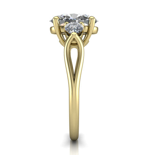Journee oval three stone engagement ring in 18K Yellow Gold, side profile showing the split-V gallery, tapered cathedral shoulders, and polished band