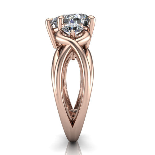Ottilie heart three stone engagement ring in 14K Rose Gold, side profile showing the braided ribbon shank with multiple bands twisting beneath the head