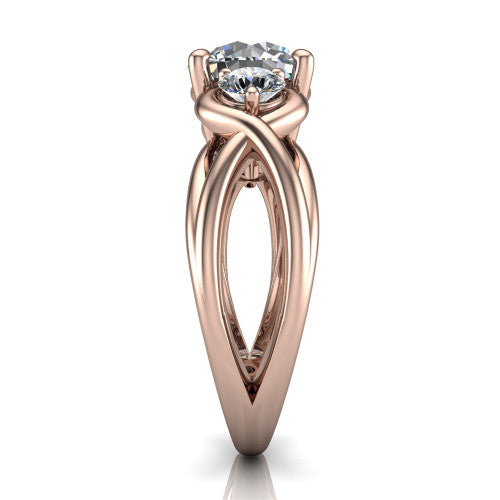 Ottilie round three stone engagement ring in 14K Rose Gold, side profile showing the braided ribbon shank with multiple bands twisting beneath the head