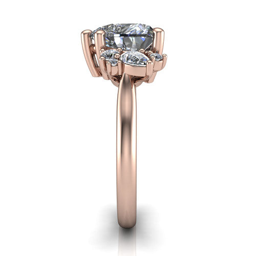 Genevieve heart three stone engagement ring in 18K Rose Gold, side profile showing the cluster head, tapered cathedral shoulders, and polished band