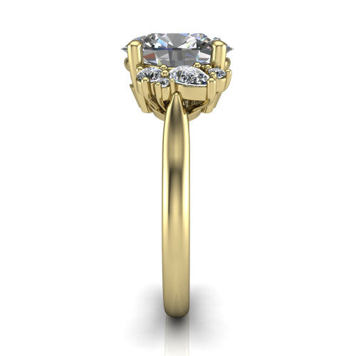 Genevieve oval three stone engagement ring in 14K Yellow Gold, side profile showing the cluster head, tapered cathedral shoulders, and polished band