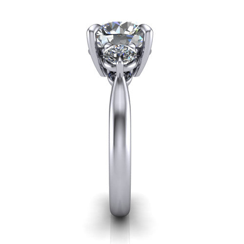 Juniper round three stone engagement ring in 18K White Gold, side profile showing the three-stone head and slim rounded polished band