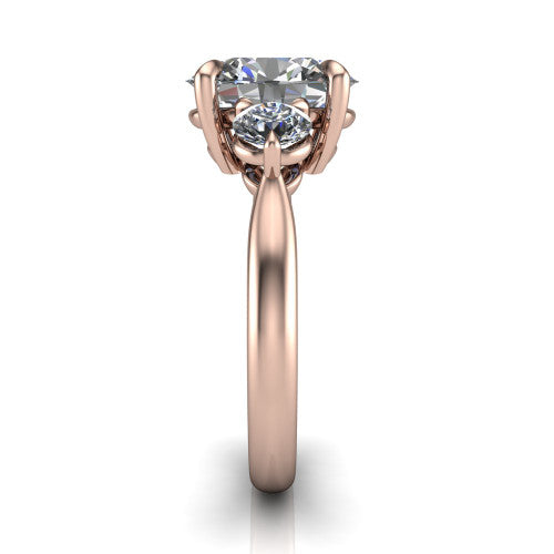 Juniper oval three stone engagement ring in 14K Rose Gold, side profile showing the three-stone head and slim rounded polished band