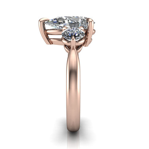 Juniper pear three stone engagement ring in 18K Rose Gold, side profile showing the three-stone head and slim rounded polished band