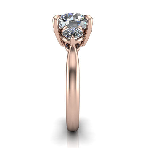 Juniper round three stone engagement ring in 14K Rose Gold, side profile showing the three-stone head and slim rounded polished band