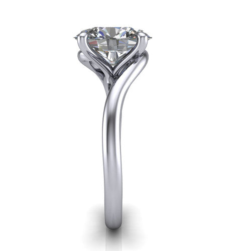 Awren oval solitaire engagement ring in 18K White Gold, side profile showing the bypass crossover shank and slim polished band