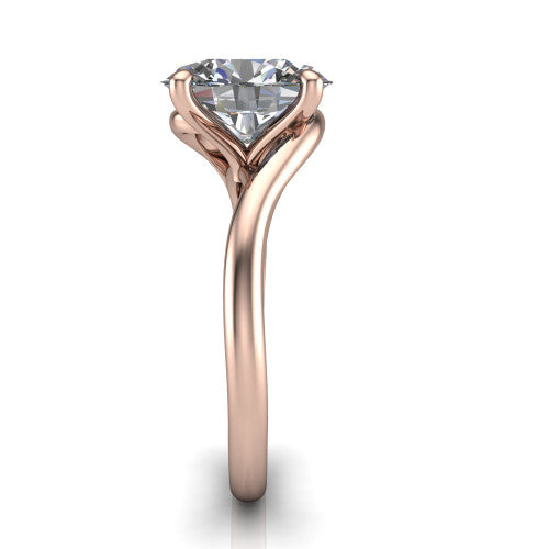 Awren oval solitaire engagement ring in 14K Rose Gold, side profile showing the bypass crossover shank and slim polished band