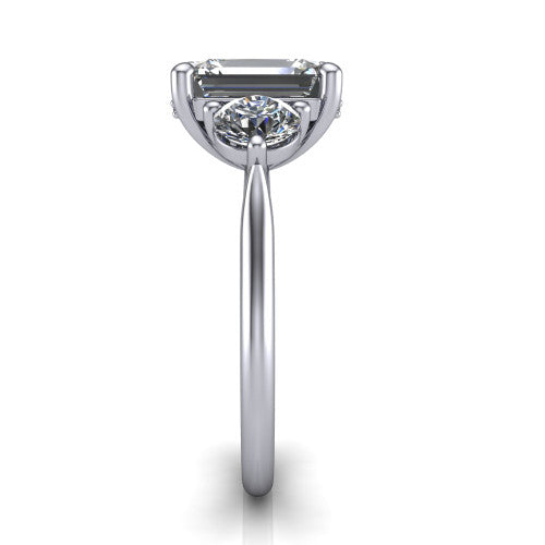 Edith emerald hidden halo engagement ring in 14K White Gold, side profile showing the tall basket, hidden pave halo beneath the center stone, and slim polished band