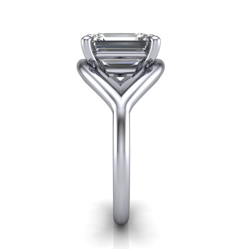 Margot emerald solitaire engagement ring in 18K White Gold, side profile showing the marquise leaf split shank and slim polished band