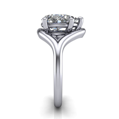 Margot pear solitaire engagement ring in 18K White Gold, side profile showing the marquise leaf split shank and slim polished band