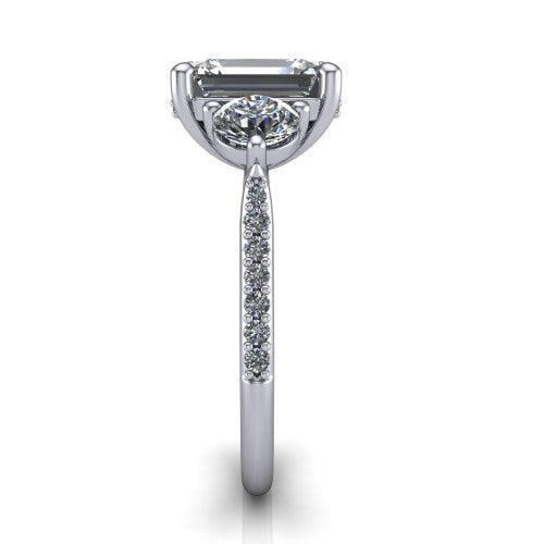 Phoebe emerald hidden halo engagement ring in 18K White Gold, side profile showing the hidden halo beneath the center and the pavé diamonds down the shank