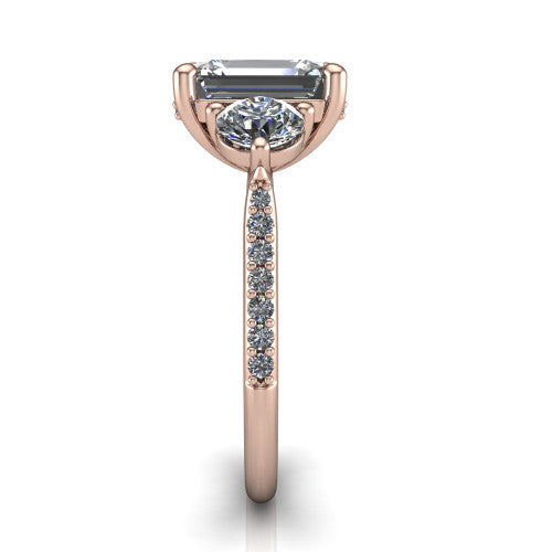 Phoebe emerald hidden halo engagement ring in 14K Rose Gold, side profile showing the hidden halo beneath the center and the pavé diamonds down the shank