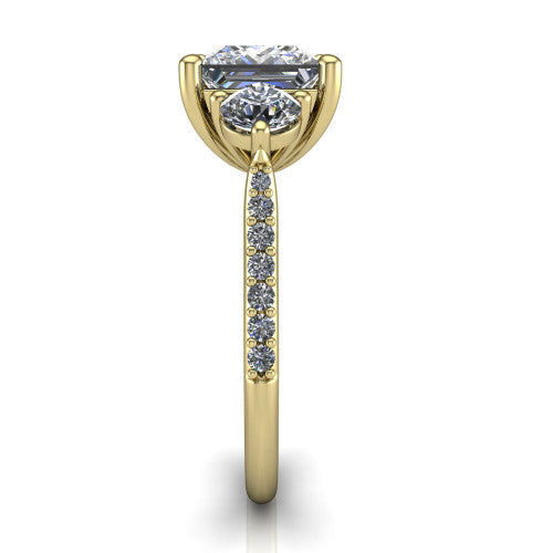 Phoebe princess hidden halo engagement ring in 14K Yellow Gold, side profile showing the hidden halo beneath the center and the pavé diamonds down the shank