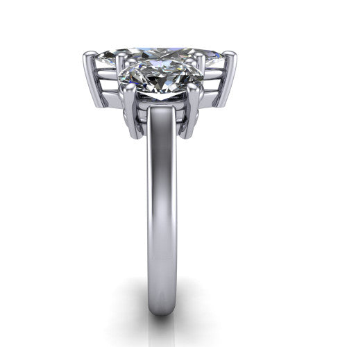 Imogen marquise three stone engagement ring in 14K White Gold, side profile showing the round side stone and the smooth tapered polished band