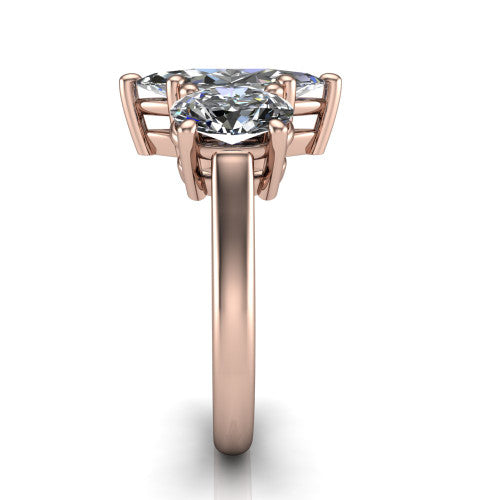 Imogen marquise three stone engagement ring in 14K Rose Gold, side profile showing the round side stone and the smooth tapered polished band