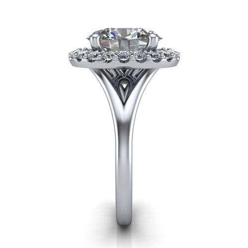 Seraphina oval halo engagement ring in Platinum, side profile showing the pavé split shank dividing into two diamond-lined rails beneath the halo