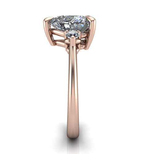 Olive heart three stone engagement ring in 18K Rose Gold, side profile showing the round side stone and the smooth tapered polished band