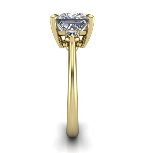 Olive princess three stone engagement ring in 18K Yellow Gold, side profile showing the round side stone and the smooth tapered polished band